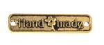 Našívací kovová značka 25x6 mm HAND MADE